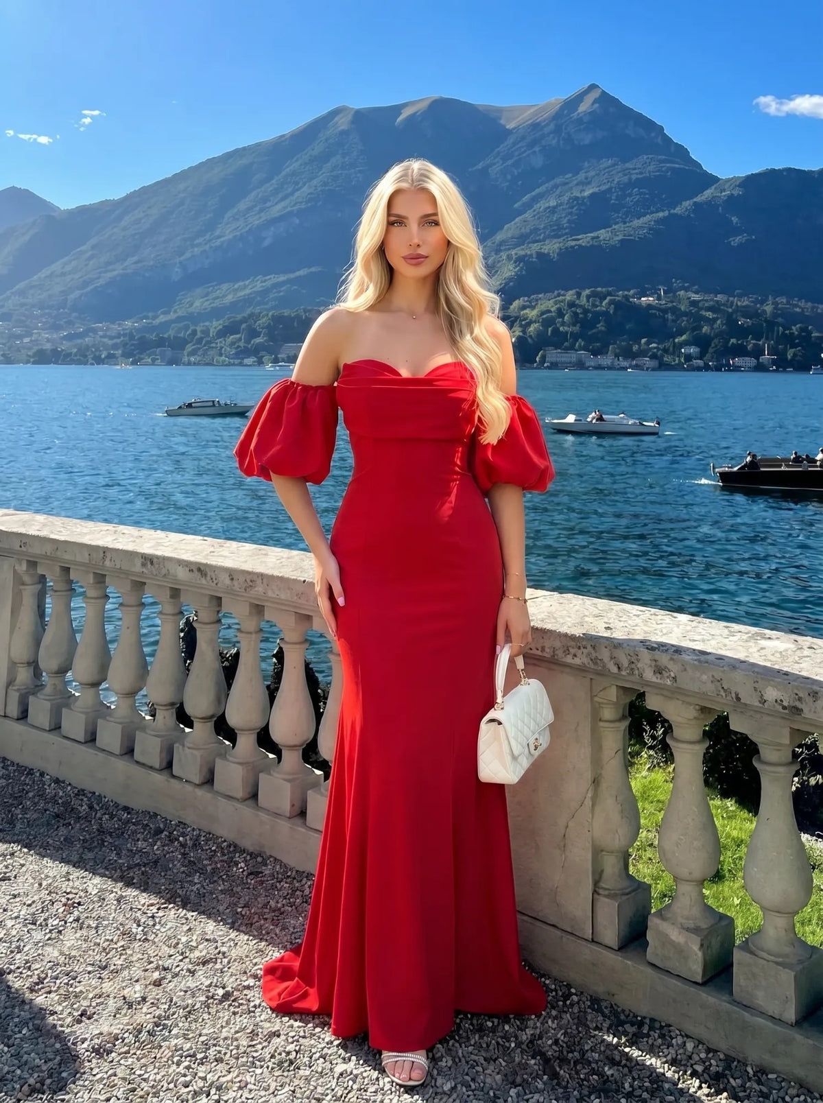 Rochia Mermaid Luxe roșie cu mâneci bufante, lângă lac
